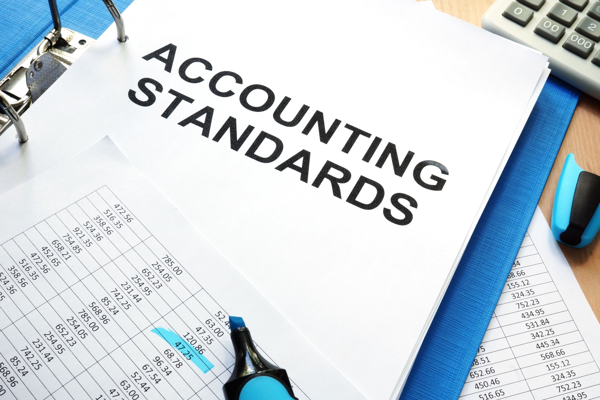 Folder with documents accounting standards on a table.